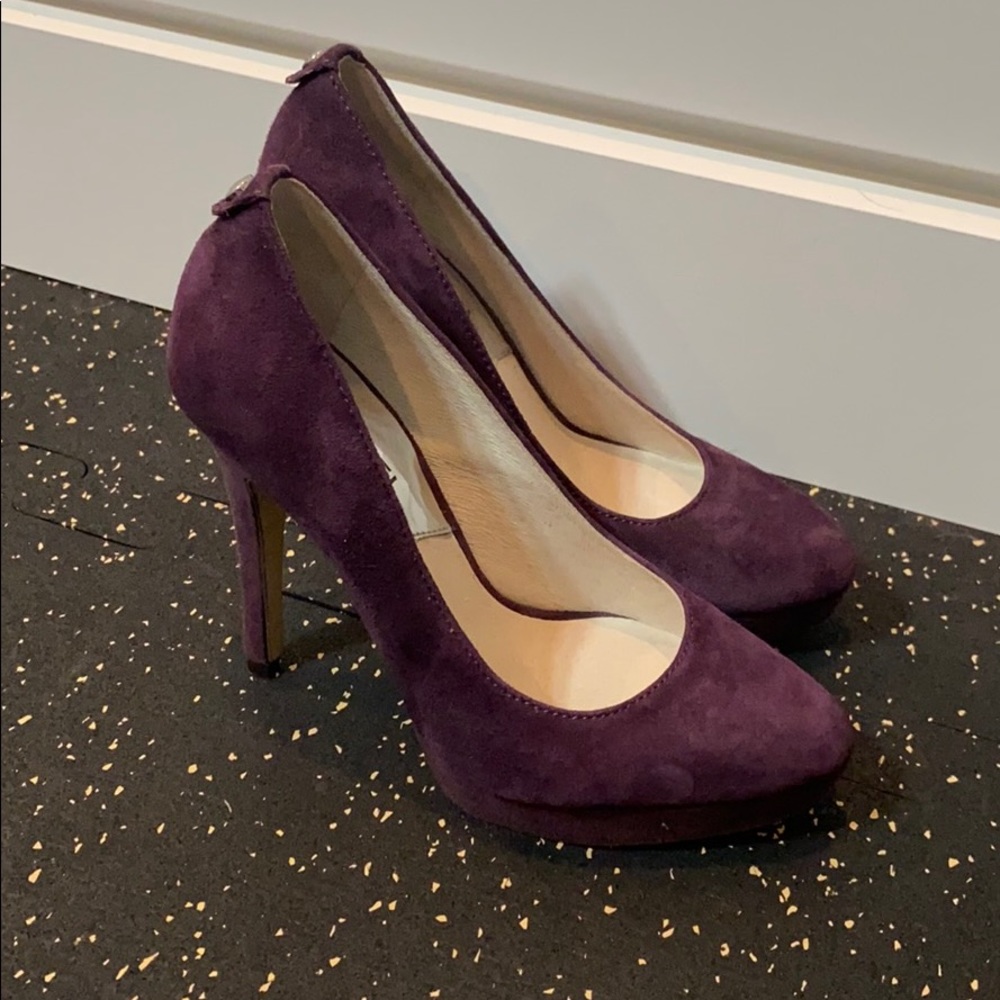 Purple suede pumps